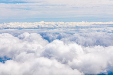 A vast landscape with clouds below you