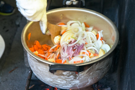 Making curry at the campsiteの写真素材