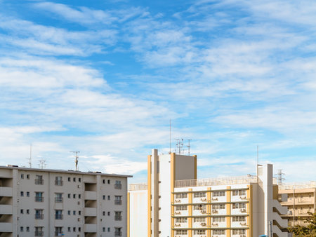 Suburban housing complexes and blue skiesの写真素材