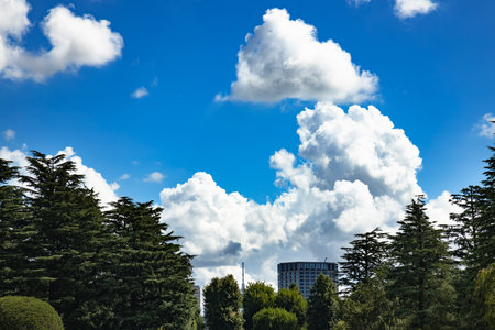 Urban Buildings, Blue Sky, and Cloudsの写真素材