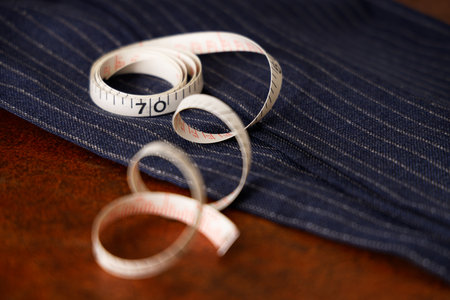 Men's Clothing Fabric and Tape measure Tailor Imageの写真素材