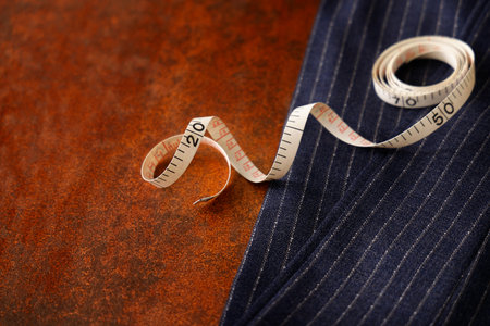 Men's Clothing Fabric and Tape measure Tailor Image