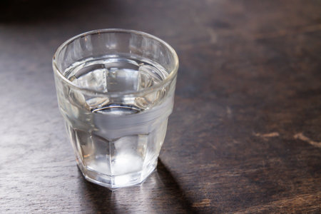 Water in a glass that looks clear and deliciousの写真素材