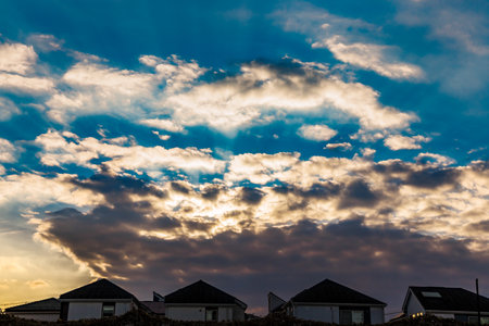 Sunset on the outskirts of Yokohama with a beautiful contrast between clouds and skyの写真素材
