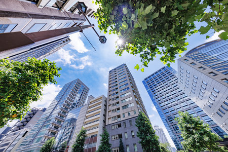 Beautiful blue sky and urban buildingsの写真素材