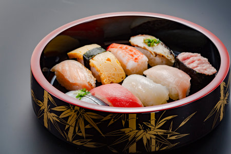 Delicious-looking sushi in a lacquered wooden tubの写真素材