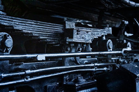 A sturdy-looking electric locomotive made of metal parts