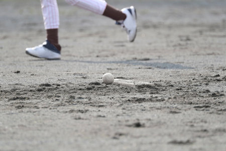 White ball of baseball on the mound