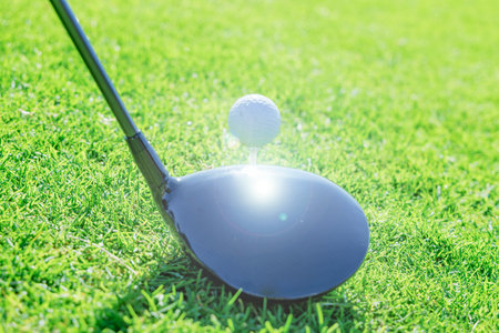 Beautiful golf course and white ballの写真素材