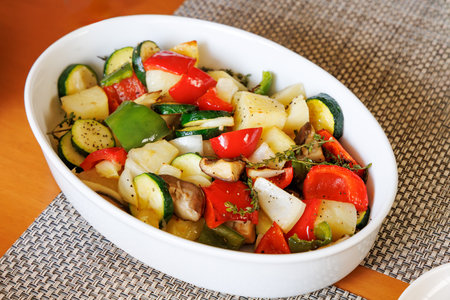 A delicious stir-fry made with a variety of colorful vegetablesの写真素材
