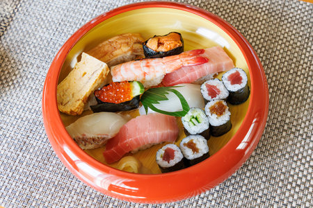 Sushi set in a bowl on a table, japanese foodの写真素材