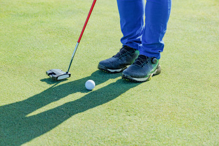Beautiful green golf course and ball