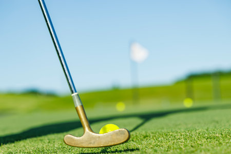 Beautiful green golf course and ball