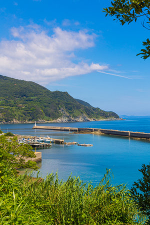 A view of the entrance to the port of San Sebastian, Spainの写真素材