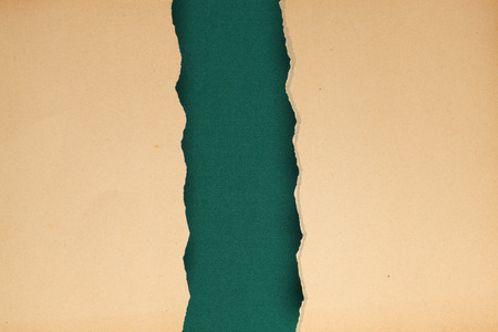 Vintage background with ripped old paperの写真素材