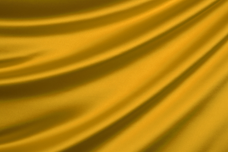 Gold silk textile backgroundの写真素材