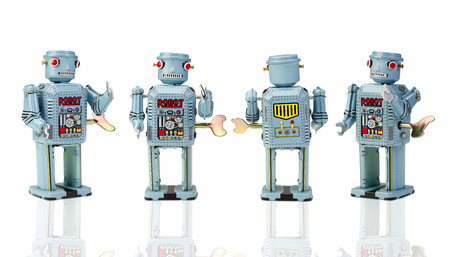 retro robot toys on white with clipping pathの写真素材