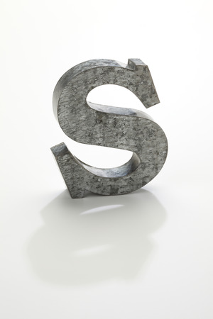 iron letter S isolated on whiteの写真素材