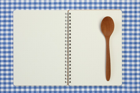 recipe book on checkered tableclothの写真素材