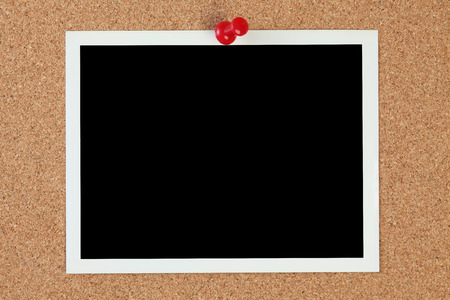 photo pinned to cork boardの写真素材