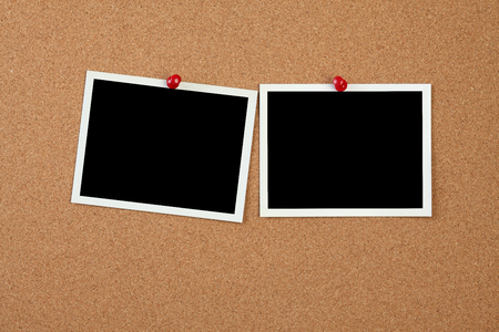 photo pinned to cork boardの写真素材