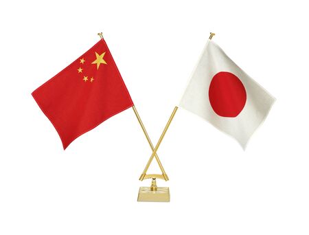 Two crossed national flags on white backgroundの写真素材