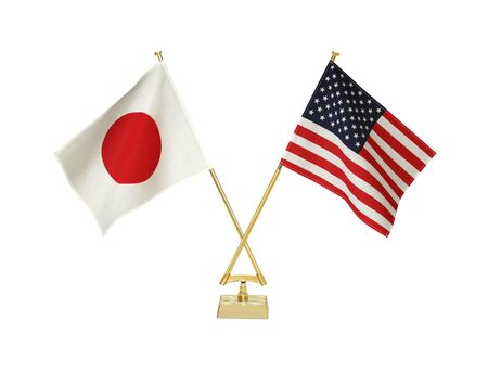 Two crossed national flags on white backgroundの写真素材