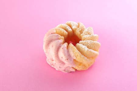 Sweet chocolate donut on pink background. Dessert foodの写真素材