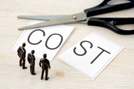 Business team to think about cost cuttingの写真素材