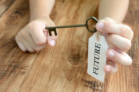 Children's Hands and the Key to the Futureの写真素材