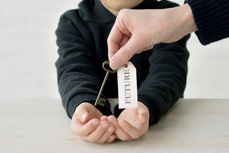 entrust parents to children the key to the futureの写真素材