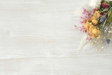 Dried flowers and wood backgroundの写真素材