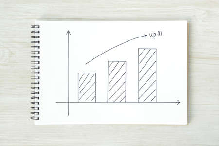 Bar charts and arrows - rising imageの写真素材
