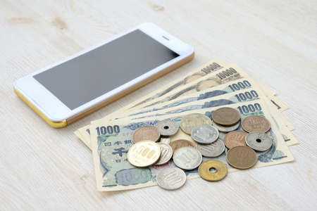 Smartphone and make moneyの写真素材