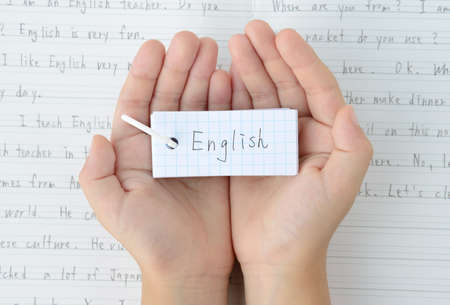 English Education Image: Children's Hands and Word Booksの写真素材