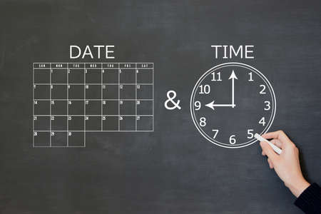 The person who paints the calendar and the clockの写真素材