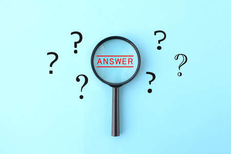 Image of finding answer with magnifying glassの写真素材