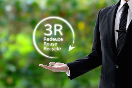 Businessman holding up 3R
