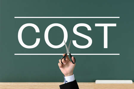 Hand and cost character of businessman with scissors - cost cut imageの写真素材