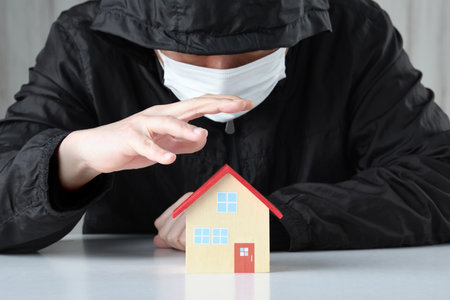 Image of criminals targeting housingの写真素材