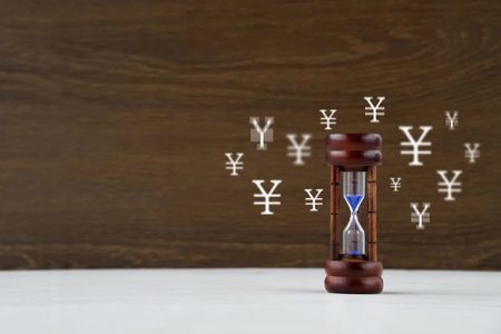 Time and money flow image: hourglass and circle mark