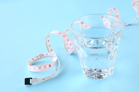 Water Diet Image - A Glass of Water and a Measure