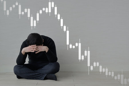 A man suffering from a stock price crashの写真素材
