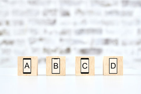 A photo of building blocks with various smartphone icons on themの写真素材