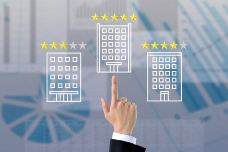 Businessman's hand pointing at a perfect five-star rating for a top-performing companyの写真素材