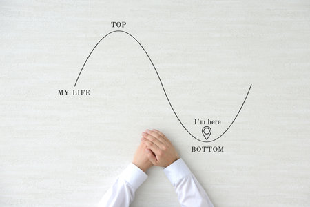 An image of someone at rock bottom in lifeの写真素材