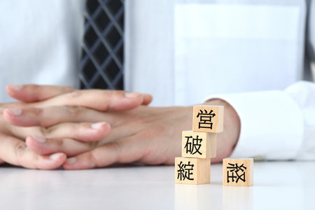 Image of a businessman from a bankrupt companyの写真素材