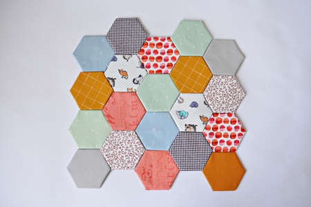 Hexagon english paper piecing templates over whiteの写真素材