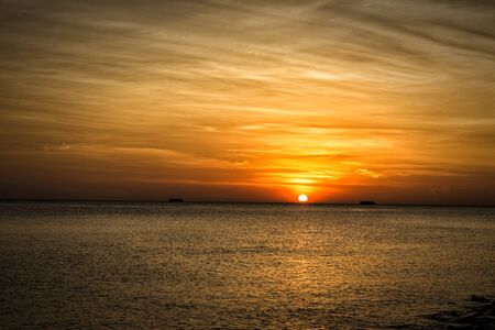 Sunset over the Malacca straitsの写真素材