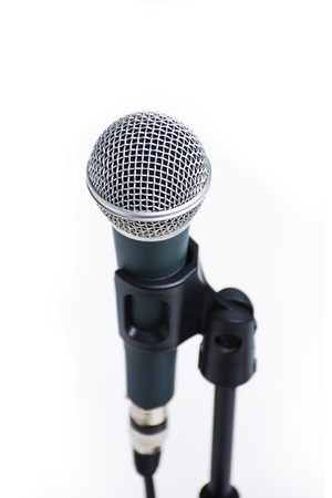 Professional vocal microphone on stand isolated on white background. audio equipment for studio and concertの写真素材